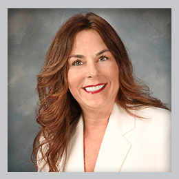 Nancy Sylvester - Executive_with border New