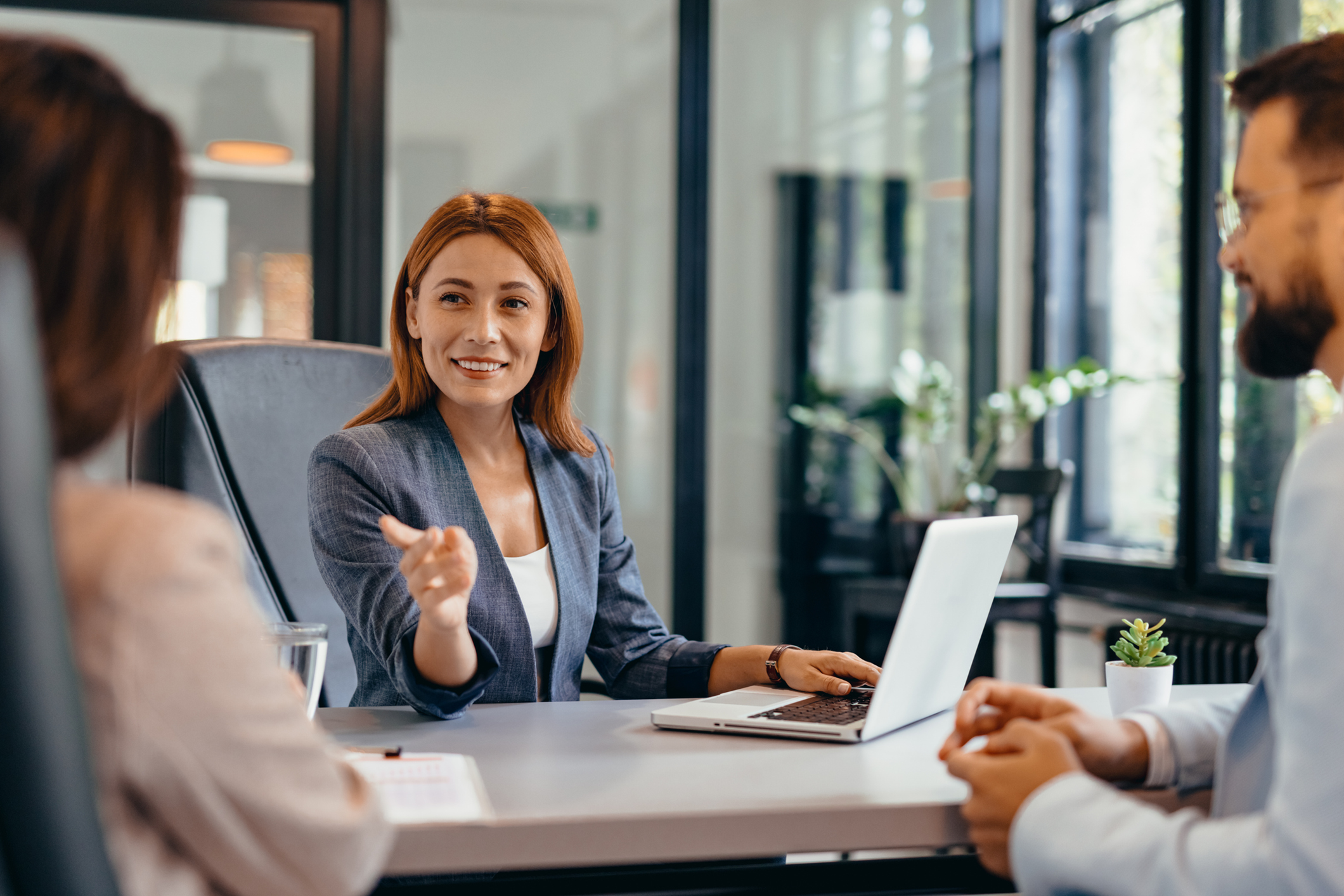 How does The Family Security Plan make money if the program costs credit unions nothing?